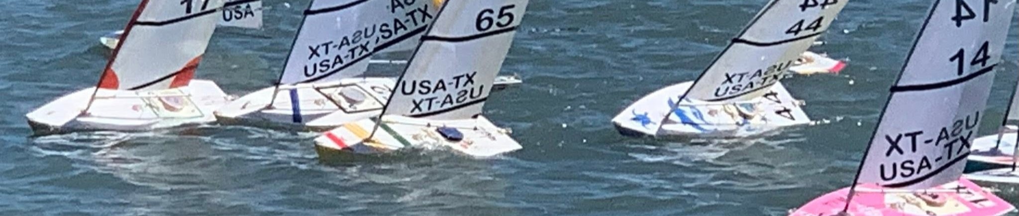 A wide view of the RC Laser fleet sailing